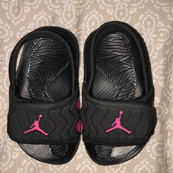 all black jordan sandals
